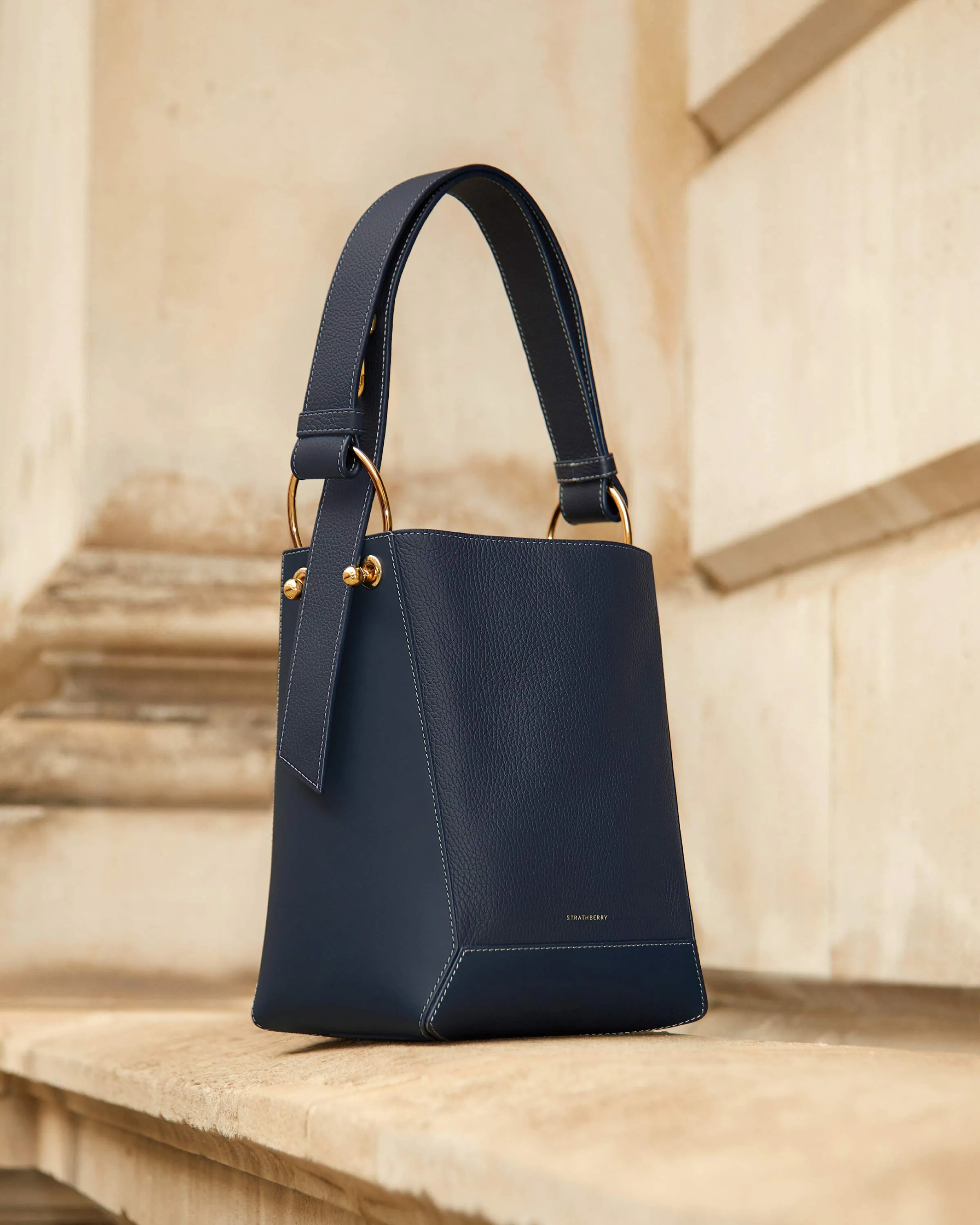 Navy Lana Midi bucket bag with grey stitching