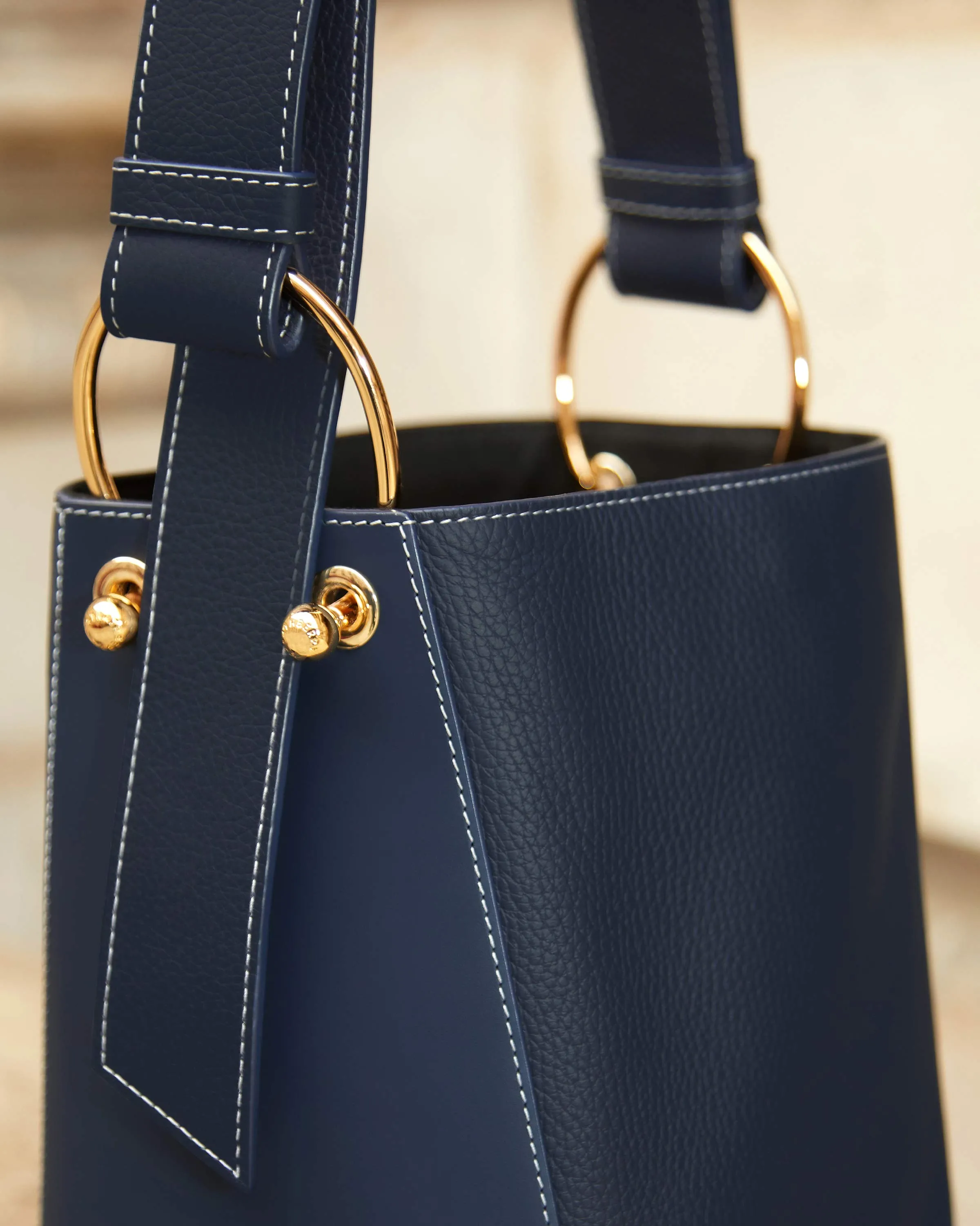 Navy Lana Midi bucket bag with grey stitching