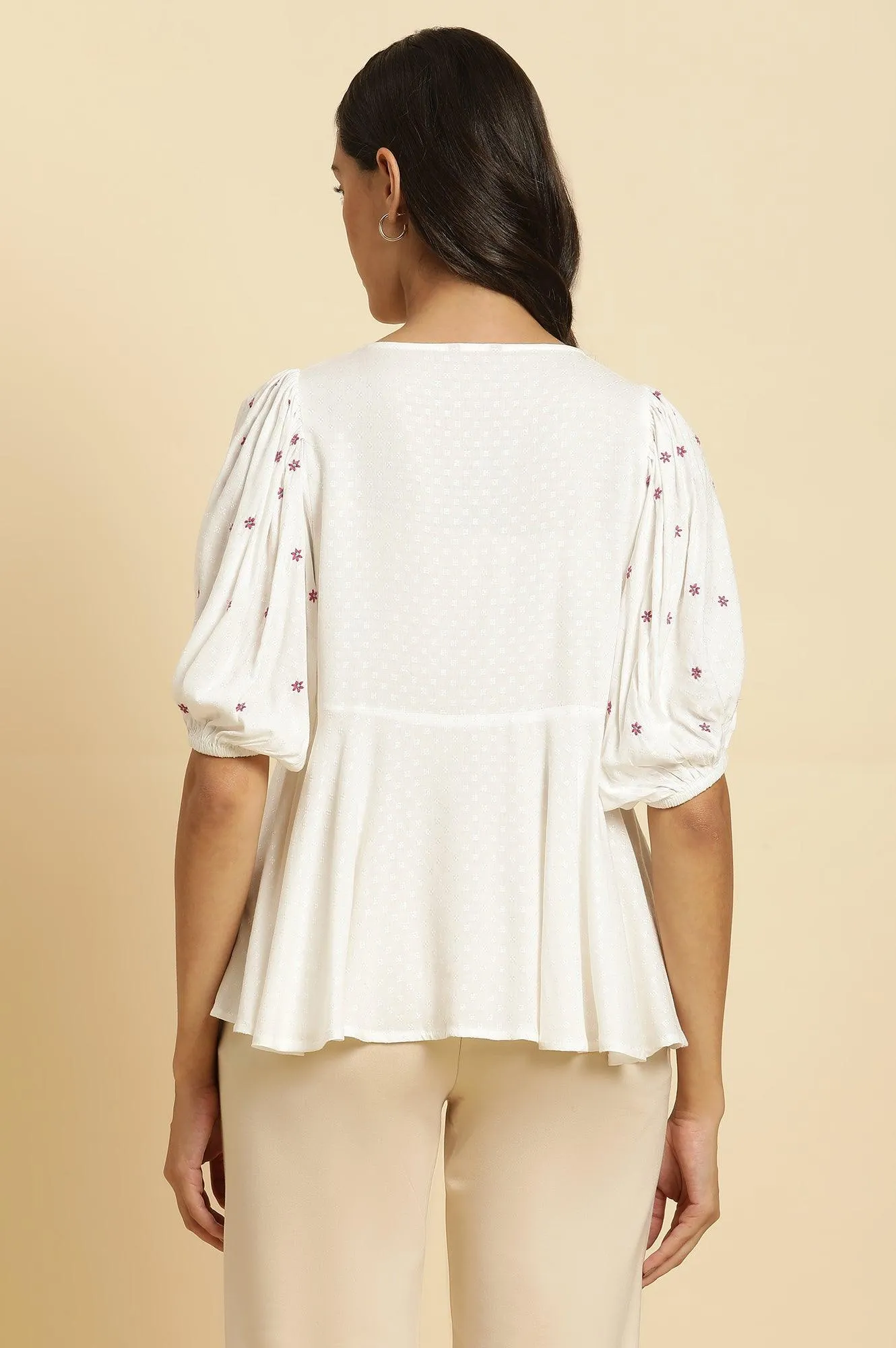 White Peplum Top With Embroidered Yoke